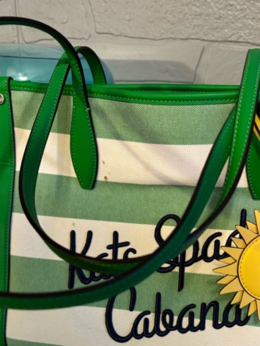This is a Kate Spade New York Market Cabana Canvas Medium Tote in green multi. - Picture 4 of 4